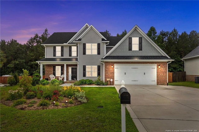 507 Coxwold Pl, Fayetteville, NC 28311 - view of front of property featuring brick siding, concrete driveway, and covered porch