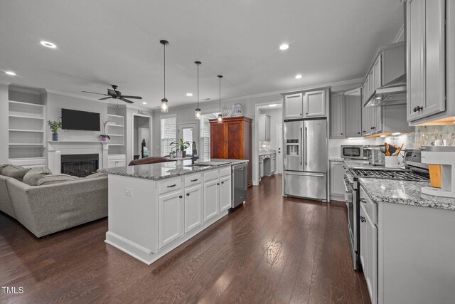 416 Fred Tew Rd, Dunn, NC 28334 - kitchen with appliances with stainless steel finishes, open floor plan, a ceiling fan, dark wood-type flooring, and recessed lighting