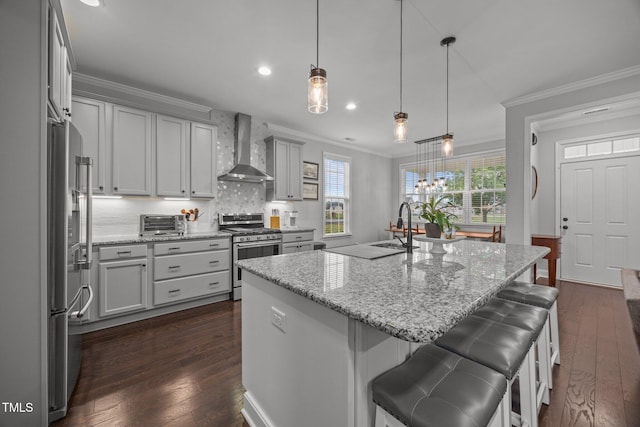416 Fred Tew Rd, Dunn, NC 28334 - kitchen with wall chimney range hood, stainless steel appliances, crown molding, dark wood-style floors, and tasteful backsplash
