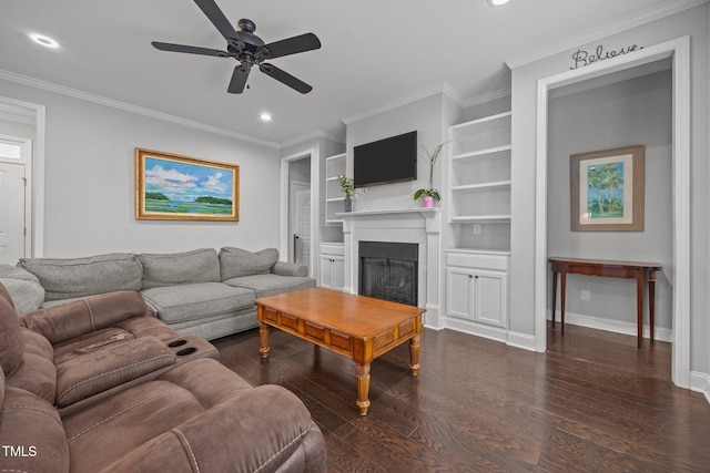 416 Fred Tew Rd, Dunn, NC 28334 - living room with a ceiling fan, a glass covered fireplace, recessed lighting, wood finished floors, and built in features