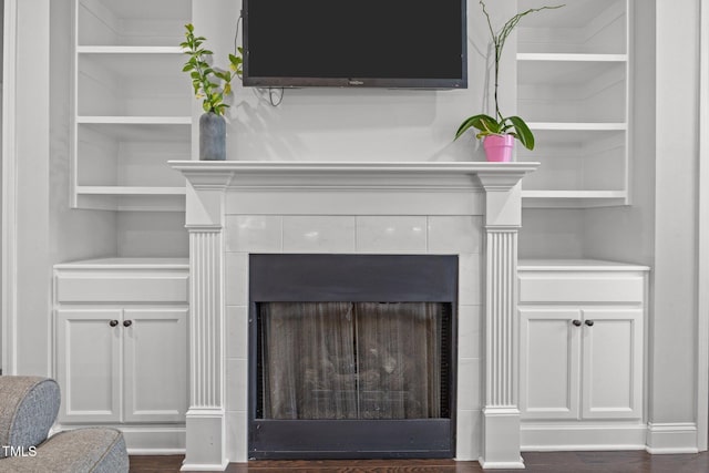 416 Fred Tew Rd, Dunn, NC 28334 - detailed view of a tile fireplace and wood finished floors
