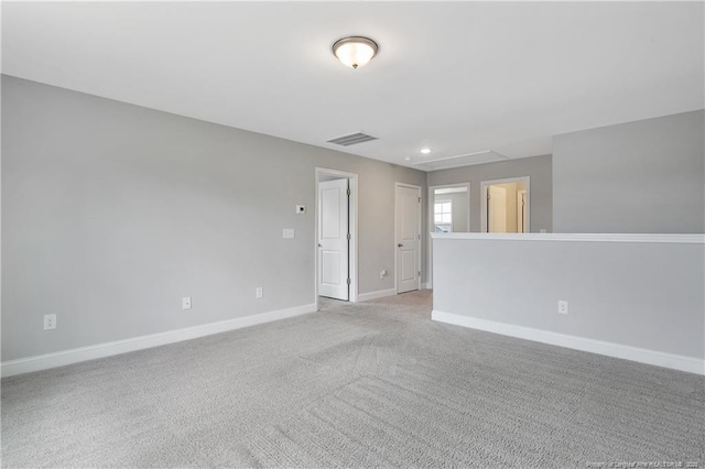 209 Nairn St, Fayetteville, NC 28311 - spare room with attic access, light carpet, and recessed lighting