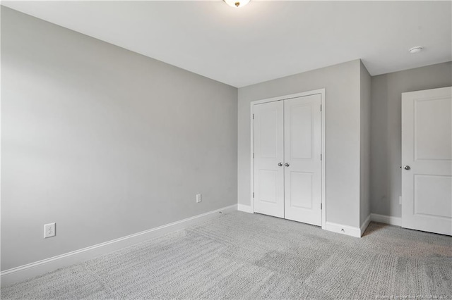 209 Nairn St, Fayetteville, NC 28311 - unfurnished bedroom featuring carpet floors and a closet