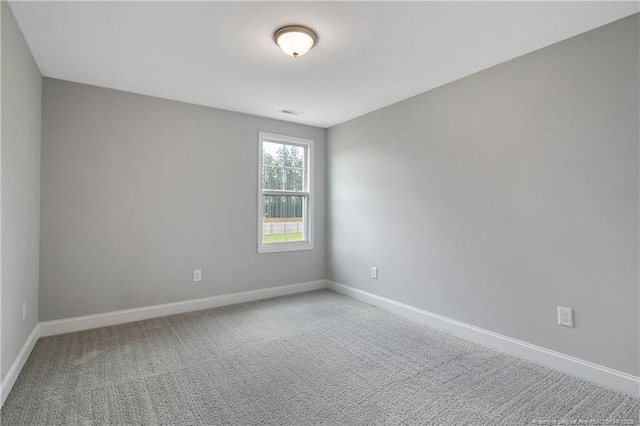 209 Nairn St, Fayetteville, NC 28311 - empty room featuring baseboards and carpet floors