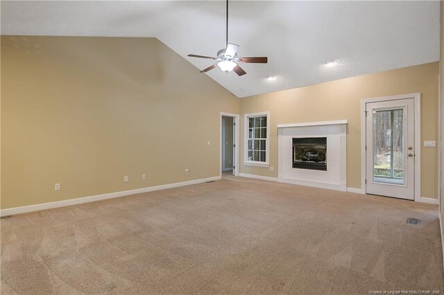 61 Fountain Park Cir, Spring Lake, NC 28390 - unfurnished living room featuring ceiling fan, carpet floors, a fireplace, and high vaulted ceiling