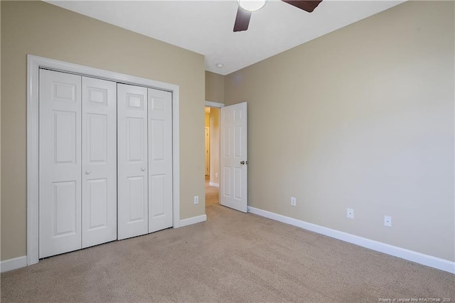 61 Fountain Park Cir, Spring Lake, NC 28390 - unfurnished bedroom featuring light colored carpet, a closet, and ceiling fan