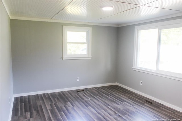 411 Rainey Dr, Spring Lake, NC 28390 - empty room with crown molding and dark wood-type flooring