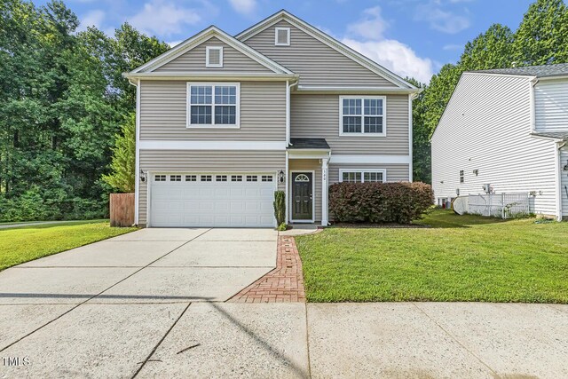 160 Chandler Springs Dr, Holly Springs, NC 27540 - traditional-style house featuring driveway, a front yard, and a garage