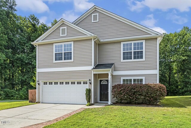 160 Chandler Springs Dr, Holly Springs, NC 27540 - traditional-style house featuring driveway, an attached garage, and a front yard