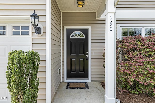 160 Chandler Springs Dr, Holly Springs, NC 27540 - entrance to property with covered porch and a garage