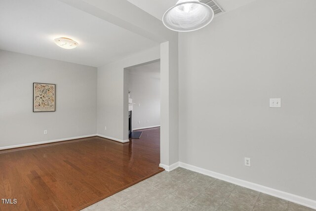 160 Chandler Springs Dr, Holly Springs, NC 27540 - spare room featuring baseboards and a fireplace