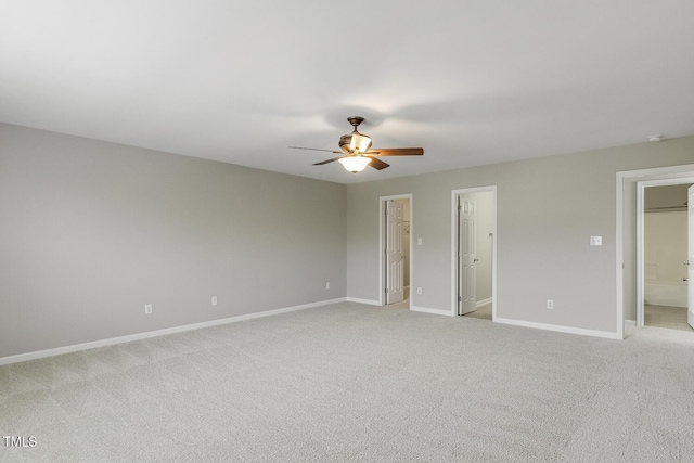 160 Chandler Springs Dr, Holly Springs, NC 27540 - unfurnished bedroom featuring light colored carpet, connected bathroom, and a ceiling fan