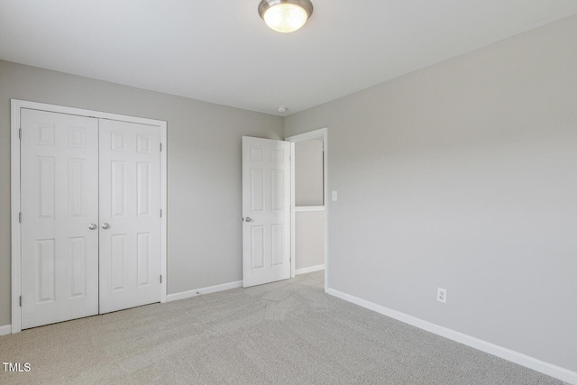 160 Chandler Springs Dr, Holly Springs, NC 27540 - unfurnished bedroom featuring carpet and a closet