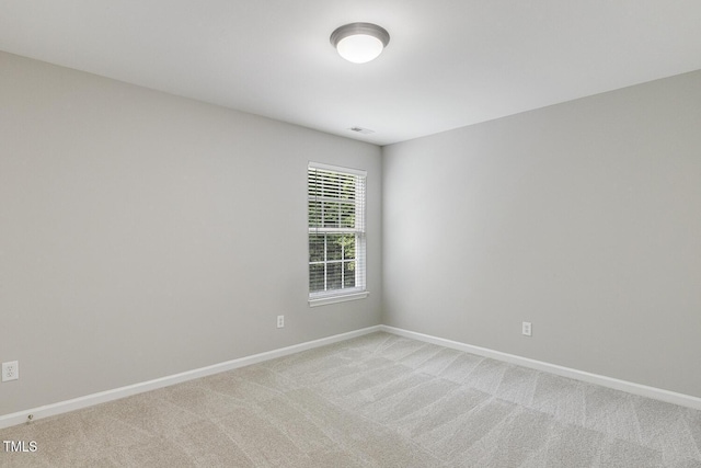 160 Chandler Springs Dr, Holly Springs, NC 27540 - spare room featuring light carpet and baseboards