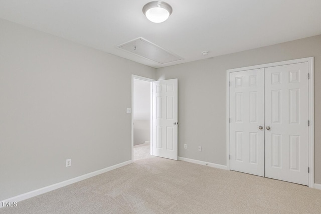 160 Chandler Springs Dr, Holly Springs, NC 27540 - unfurnished bedroom with attic access, carpet flooring, and a closet