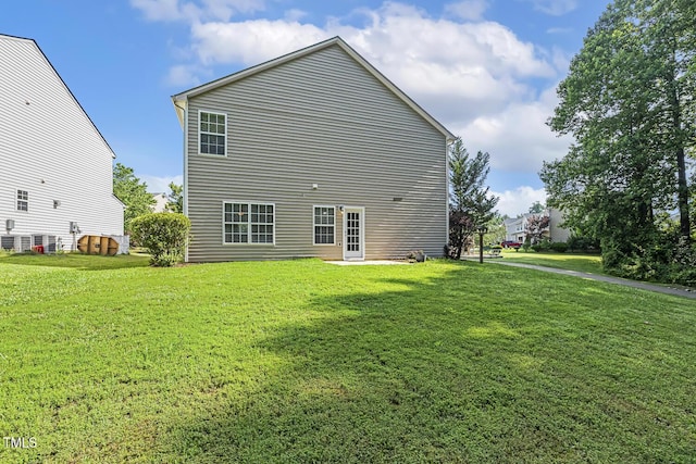 160 Chandler Springs Dr, Holly Springs, NC 27540 - back of house with a yard