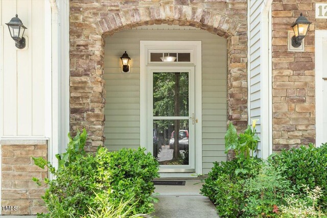 1213 Silver Beach Way, Raleigh, NC 27606 - doorway to property with brick siding