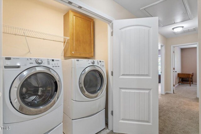 1213 Silver Beach Way, Raleigh, NC 27606 - laundry room with attic access, washer and dryer, cabinet space, and light carpet