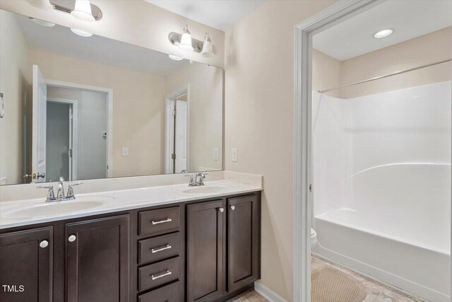 1213 Silver Beach Way, Raleigh, NC 27606 - bathroom with double vanity,  shower combination, and tile patterned flooring