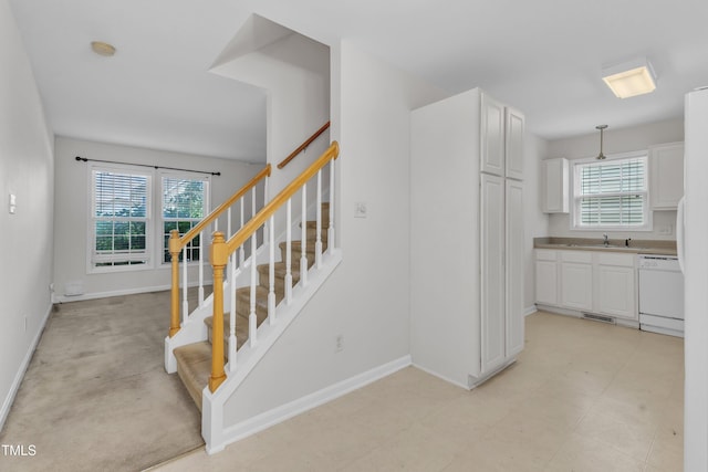 4825 Windbreak Ln, Raleigh, NC 27616 - staircase featuring baseboards