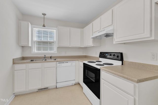 4825 Windbreak Ln, Raleigh, NC 27616 - kitchen featuring dishwasher, range with electric cooktop, under cabinet range hood, and white cabinetry