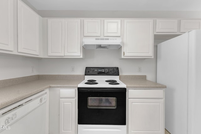 4825 Windbreak Ln, Raleigh, NC 27616 - kitchen with white appliances, under cabinet range hood, white cabinets, and light countertops