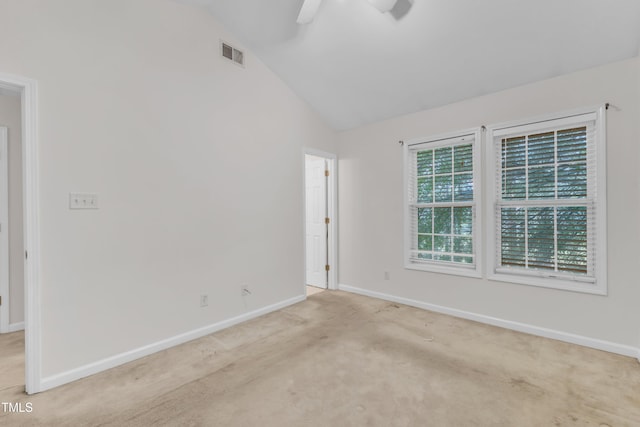 4825 Windbreak Ln, Raleigh, NC 27616 - spare room with lofted ceiling, light carpet, and ceiling fan