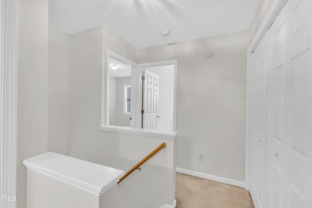 4825 Windbreak Ln, Raleigh, NC 27616 - hall featuring light carpet and baseboards