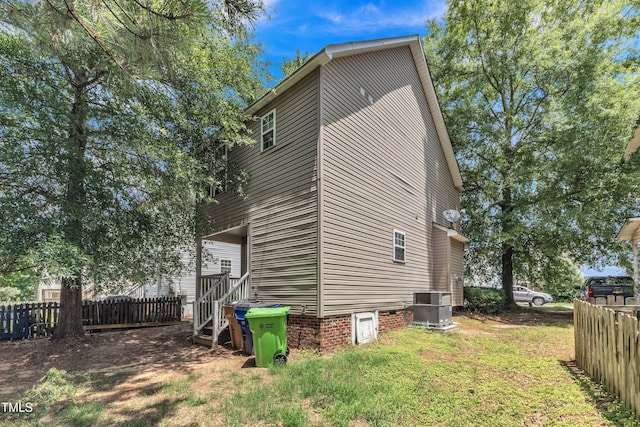 4825 Windbreak Ln, Raleigh, NC 27616 - view of side of property with a central AC unit