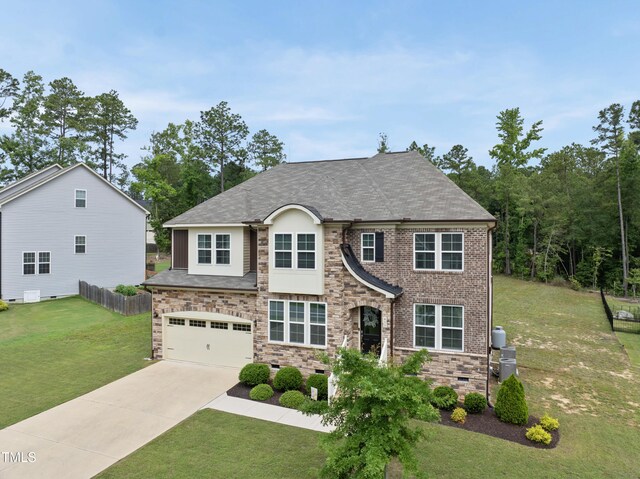 433 Village Bend Dr, Fuquay Varina, NC 27526 - traditional-style home featuring driveway, a garage, and roof with shingles