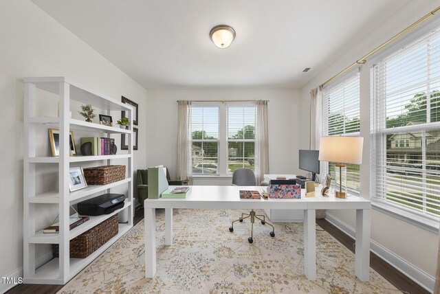 433 Village Bend Dr, Fuquay Varina, NC 27526 - office area with baseboards and wood finished floors