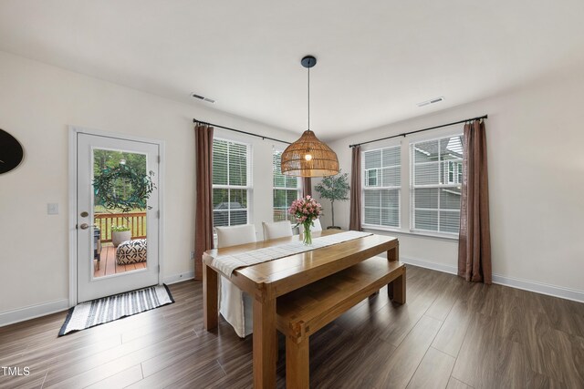 433 Village Bend Dr, Fuquay Varina, NC 27526 - dining area featuring dark wood-style floors and baseboards