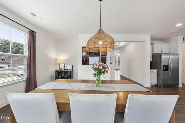 433 Village Bend Dr, Fuquay Varina, NC 27526 - dining space featuring dark wood-style floors and plenty of natural light