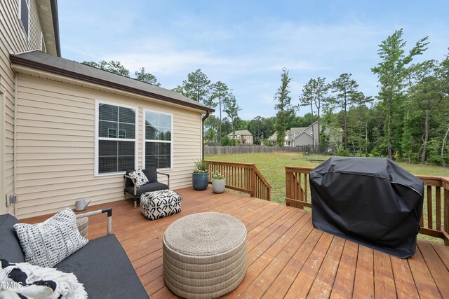 433 Village Bend Dr, Fuquay Varina, NC 27526 - wooden deck with a grill and a fenced backyard