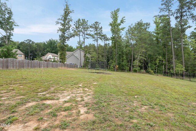 433 Village Bend Dr, Fuquay Varina, NC 27526 - view of yard featuring a trampoline