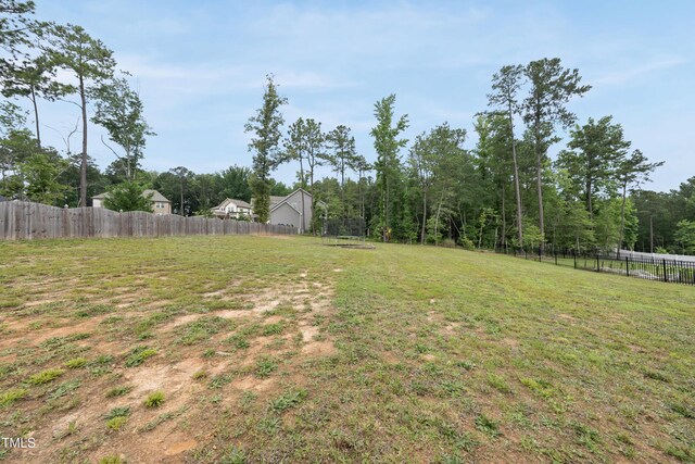 433 Village Bend Dr, Fuquay Varina, NC 27526 - view of yard featuring a trampoline
