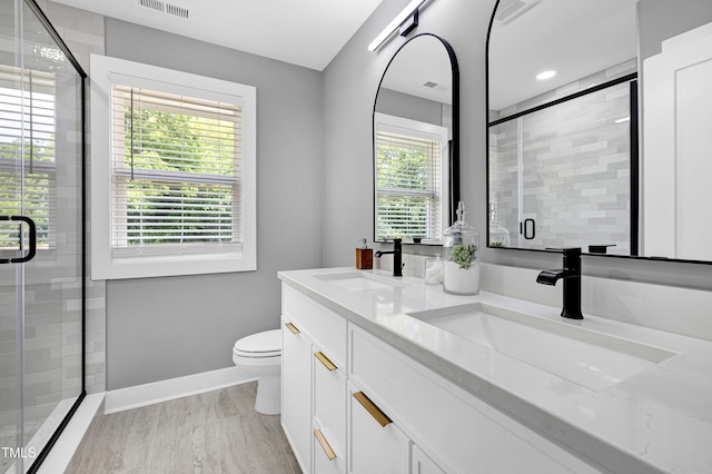 1410 Joe Louis Ave, Raleigh, NC 27610 - bathroom with double vanity and a stall shower