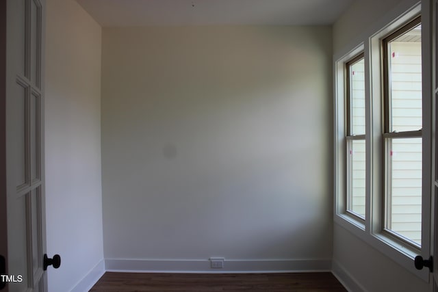 70 Basil Ct, Franklinton, NC 27525 - spare room with dark wood-style floors and baseboards