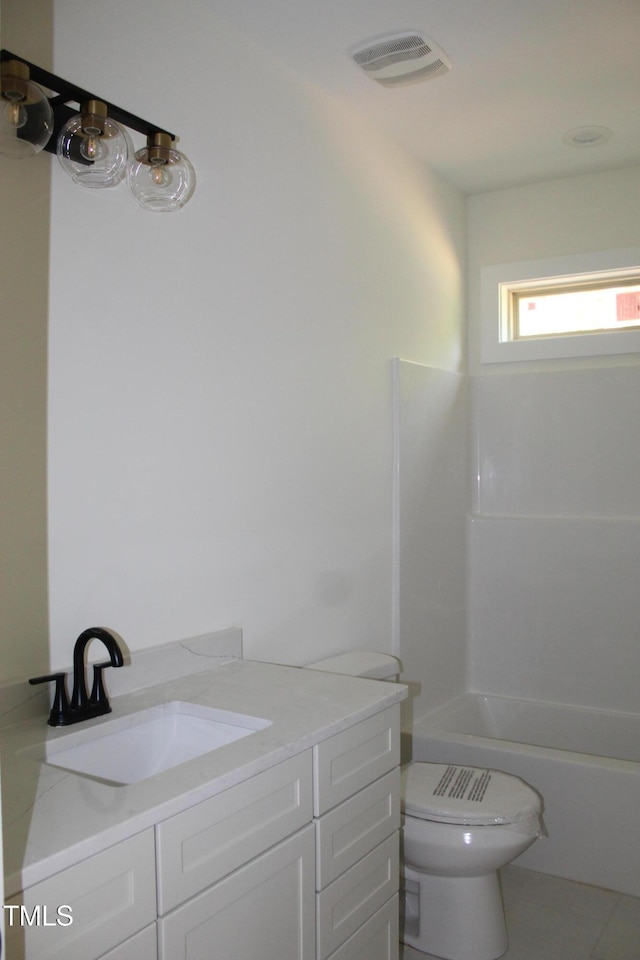 70 Basil Ct, Franklinton, NC 27525 - bathroom featuring vanity, bathing tub / shower combination, and tile patterned flooring