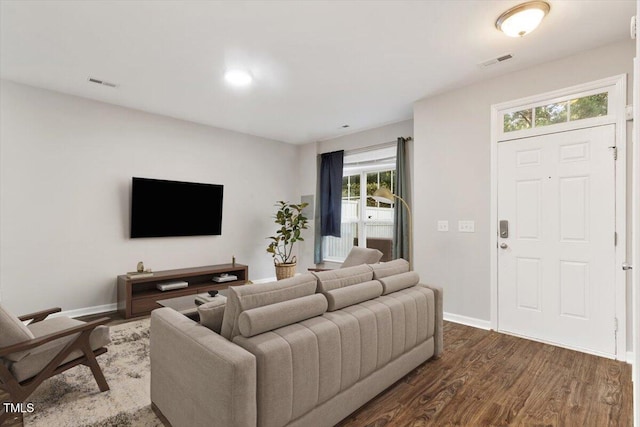 330 Gilman Ln Unit 109, Raleigh, NC 27610 - living room with dark wood-type flooring and baseboards