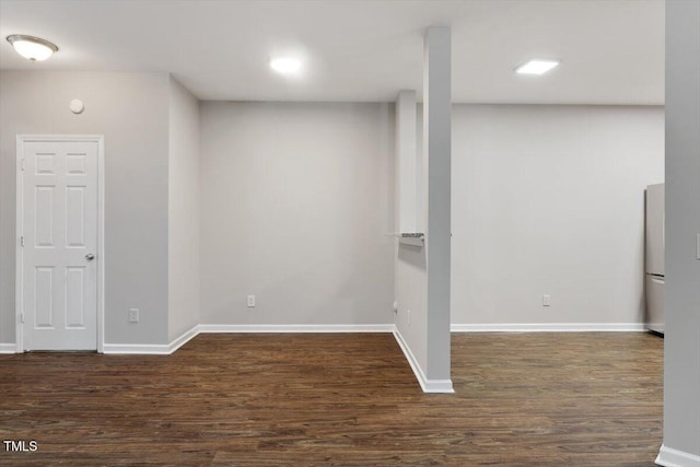 330 Gilman Ln Unit 109, Raleigh, NC 27610 - finished basement with wood finished floors and freestanding refrigerator