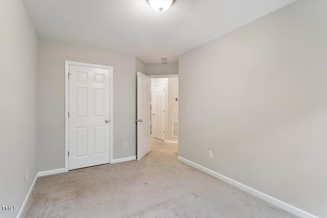 330 Gilman Ln Unit 109, Raleigh, NC 27610 - unfurnished bedroom with carpet and baseboards
