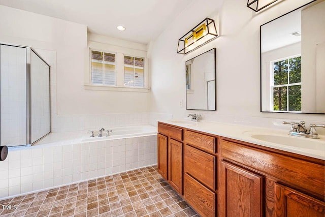 1168 Great Ridge Parkway, Chapel Hill, NC 27516 - bathroom featuring a bath, double vanity, and a shower with door
