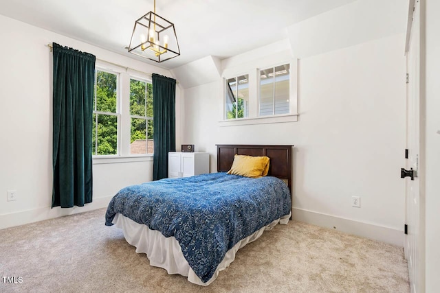 1168 Great Ridge Parkway, Chapel Hill, NC 27516 - bedroom featuring carpet flooring and a chandelier