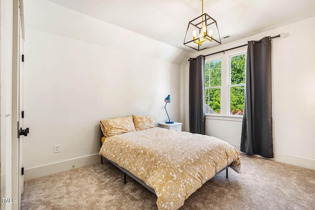1168 Great Ridge Parkway, Chapel Hill, NC 27516 - carpeted bedroom featuring a chandelier and vaulted ceiling