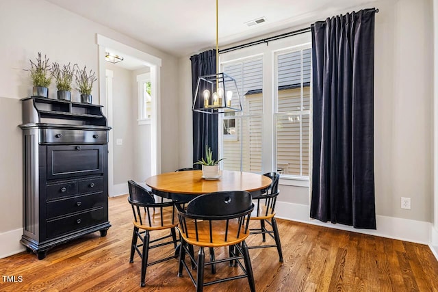 1168 Great Ridge Parkway, Chapel Hill, NC 27516 - dining space featuring wood finished floors and a chandelier