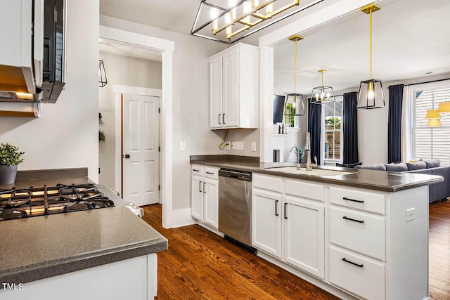 1168 Great Ridge Parkway, Chapel Hill, NC 27516 - kitchen with dishwasher, dark countertops, a peninsula, a chandelier, and dark wood-style flooring