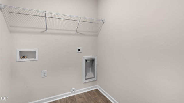 100 Grove Ln, Goldsboro, NC 27534 - laundry room featuring washer hookup, hookup for an electric dryer, dark wood-type flooring, and hookup for a gas dryer