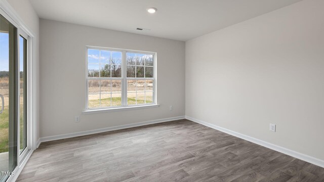 100 Grove Ln, Goldsboro, NC 27534 - spare room featuring wood finished floors and recessed lighting