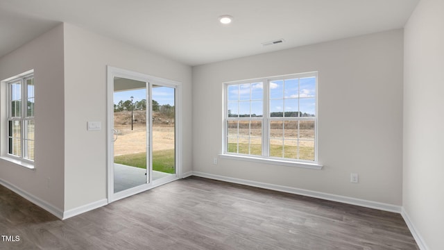 100 Grove Ln, Goldsboro, NC 27534 - unfurnished room with wood finished floors and recessed lighting